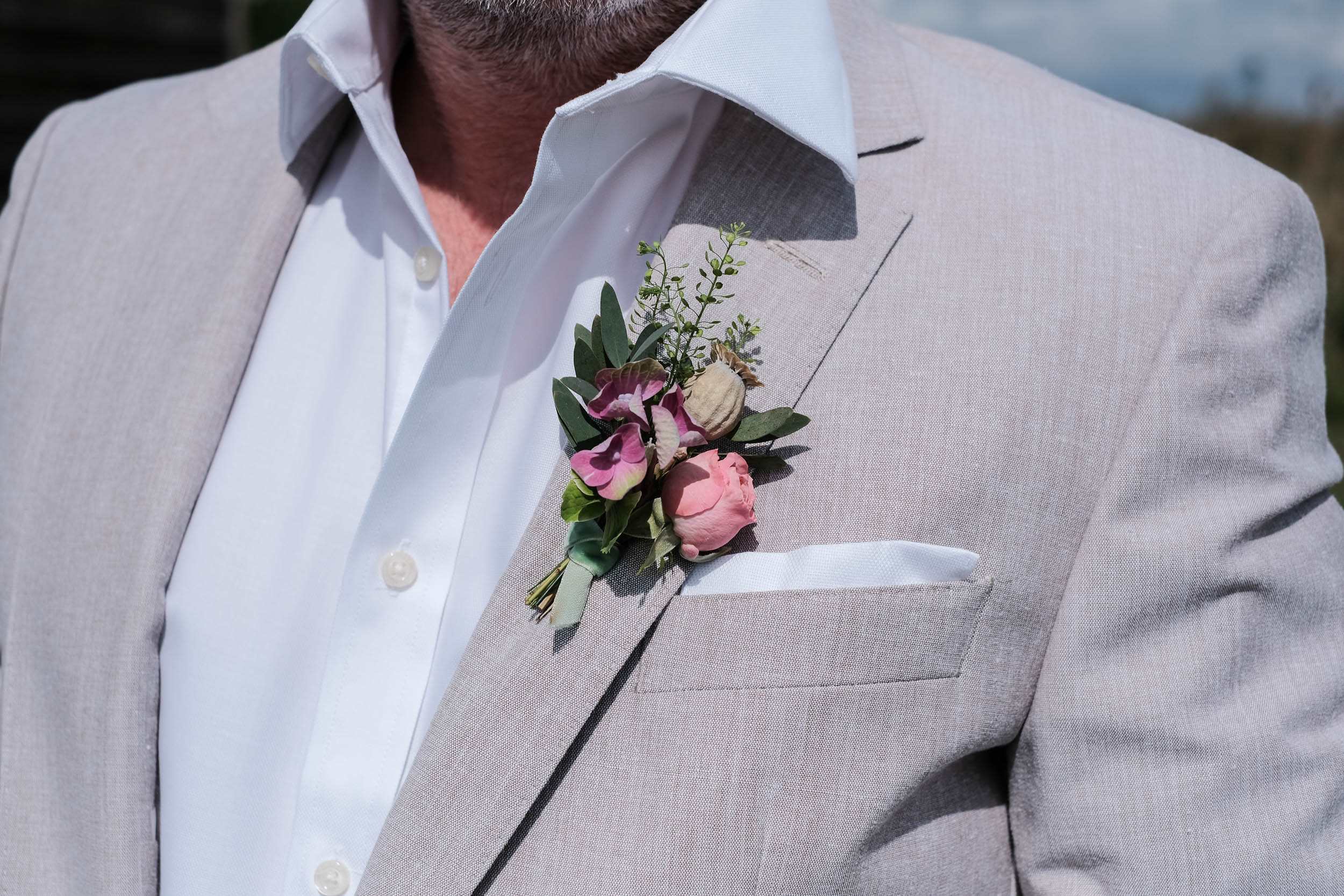 Pinning a flower button-hole